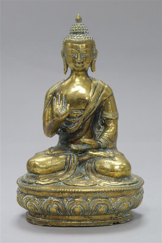 A bronze figure of Buddha